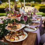 rustic dessert table with gold flaked macarons